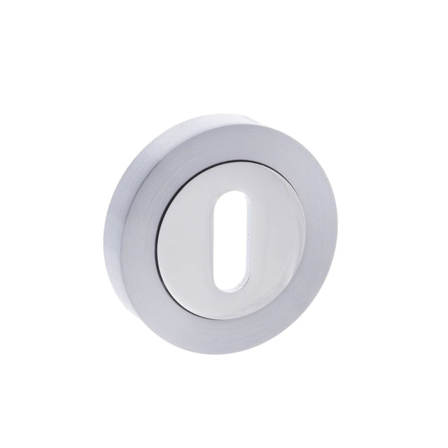 This is an image of STATUS Key Escutcheon on Round Rose - Satin Chrome/Polished Chrome available to order from T.H Wiggans Architectural Ironmongery in Kendal, quick delivery and discounted prices.