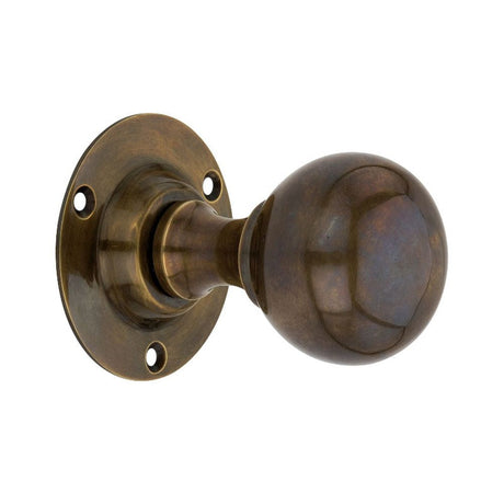 This is an image of Spira Brass - Ball Door Knob Antique available to order from T.H Wiggans Architectural Ironmongery in Kendal, quick delivery and discounted prices.