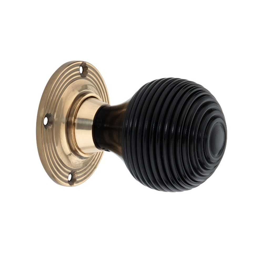 This is an image of Spira Brass - Ebony Beehive Rim/Mortice Door Knob Aged Brass available to order from T.H Wiggans Architectural Ironmongery in Kendal, quick delivery and discounted prices.