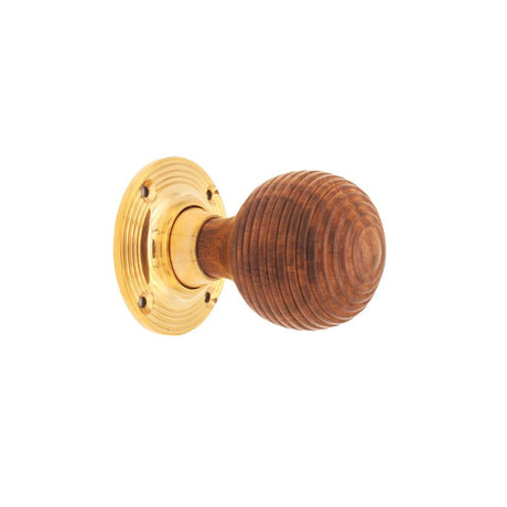 This is an image of Spira Brass - Rosewood Beehive Rim/Mortice Door Knob Polished Brass available to order from T.H Wiggans Architectural Ironmongery in Kendal, quick delivery and discounted prices.
