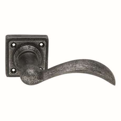 This is an image of Spira Brass - Curved Lever on Square Rose Pewter available to order from T.H Wiggans Architectural Ironmongery in Kendal, quick delivery and discounted prices.
