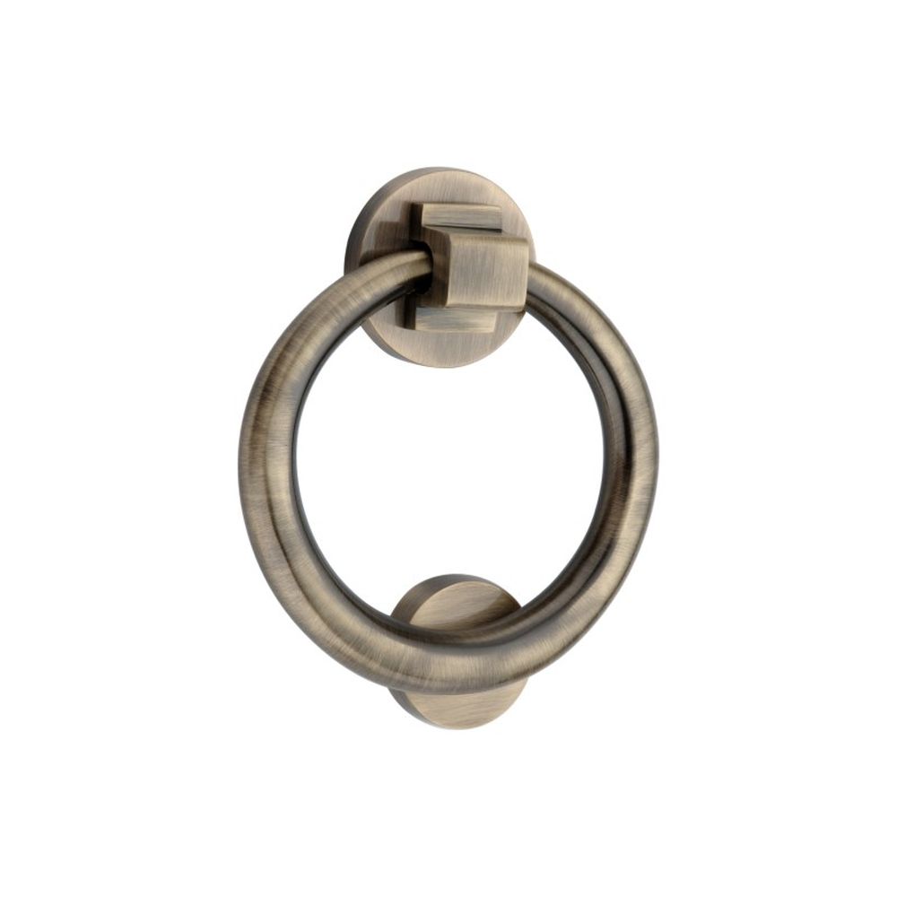 This is an image of Spira Brass - Ring Door Knocker 110mm Antique Brass available to order from T.H Wiggans Architectural Ironmongery in Kendal, quick delivery and discounted prices.