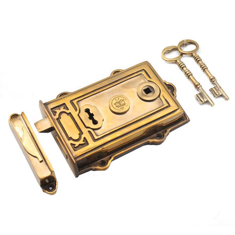This is an image of Spira Brass - Davenport Rim Lock Aged Brass available to order from T.H Wiggans Architectural Ironmongery in Kendal, quick delivery and discounted prices.