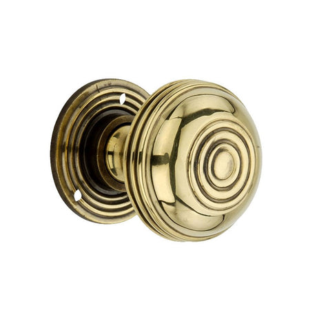 This is an image of Spira Brass - Bloxwich 50mm Rim/Mortice Door Knob Aged Brass available to order from T.H Wiggans Architectural Ironmongery in Kendal, quick delivery and discounted prices.