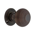 This is an image of Spira Brass - Beehive 50mm Rim/Mortice Door Knob Aged Bronze available to order from T.H Wiggans Architectural Ironmongery in Kendal, quick delivery and discounted prices.