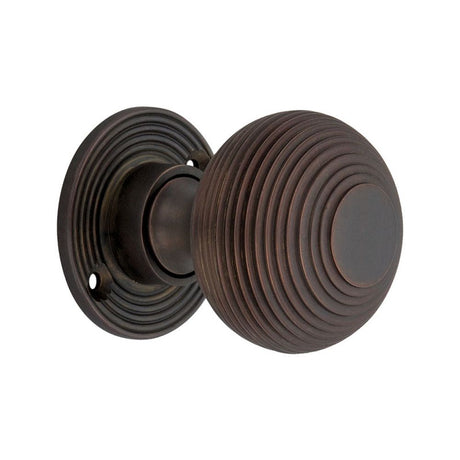 This is an image of Spira Brass - Beehive 50mm Rim/Mortice Door Knob Aged Bronze available to order from T.H Wiggans Architectural Ironmongery in Kendal, quick delivery and discounted prices.