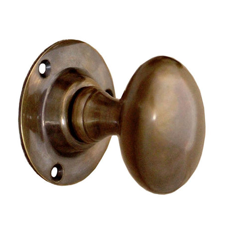 This is an image of Spira Brass - Oval Mortice Door Knob Antique available to order from T.H Wiggans Architectural Ironmongery in Kendal, quick delivery and discounted prices.