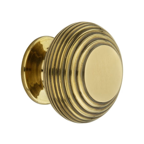 This is an image of Spira Brass - Beehive Large 40mm Cupboard Knob Aged Brass  available to order from T.H Wiggans Architectural Ironmongery in Kendal, quick delivery and discounted prices.