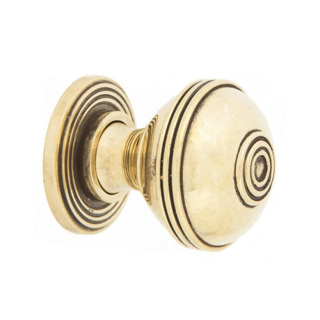 This is an image of Spira Brass - Preston Large 38mm Cupboard Knob Aged Brass  available to order from T.H Wiggans Architectural Ironmongery in Kendal, quick delivery and discounted prices.