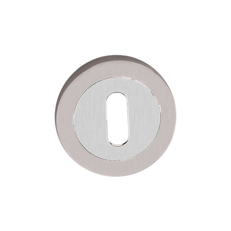 This is an image of Spira Brass - Oval Standard Escutcheon Dual Tone available to order from T.H Wiggans Architectural Ironmongery in Kendal, quick delivery and discounted prices.