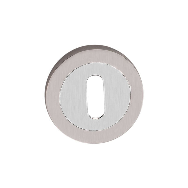 This is an image of Spira Brass - Oval Standard Escutcheon Dual Tone available to order from T.H Wiggans Architectural Ironmongery in Kendal, quick delivery and discounted prices.