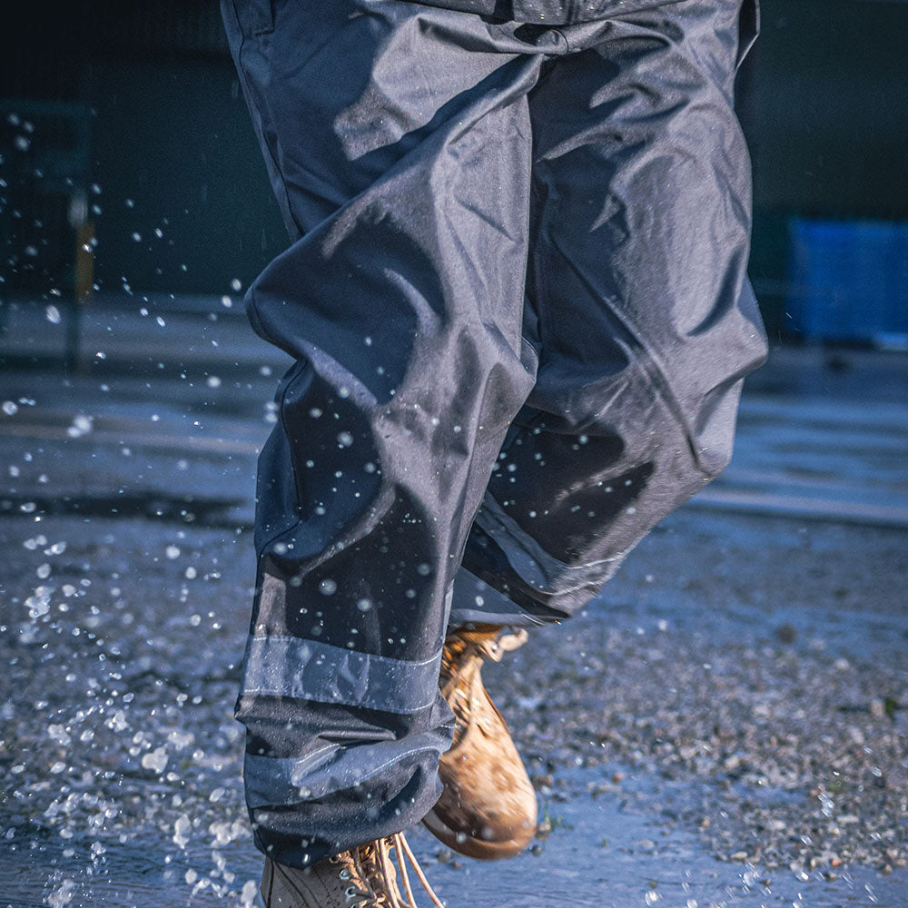 This is an image showing TIMCO Waterproof Trousers - Charcoal - Large - 1 Each Bag available from T.H Wiggans Ironmongery in Kendal, quick delivery at discounted prices.