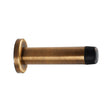 This is an image of Carlisle Brass - Cylinder Pattern Door Stop - with Rose - Antique Brass available to order from T.H Wiggans Architectural Ironmongery in Kendal, quick delivery and discounted prices.