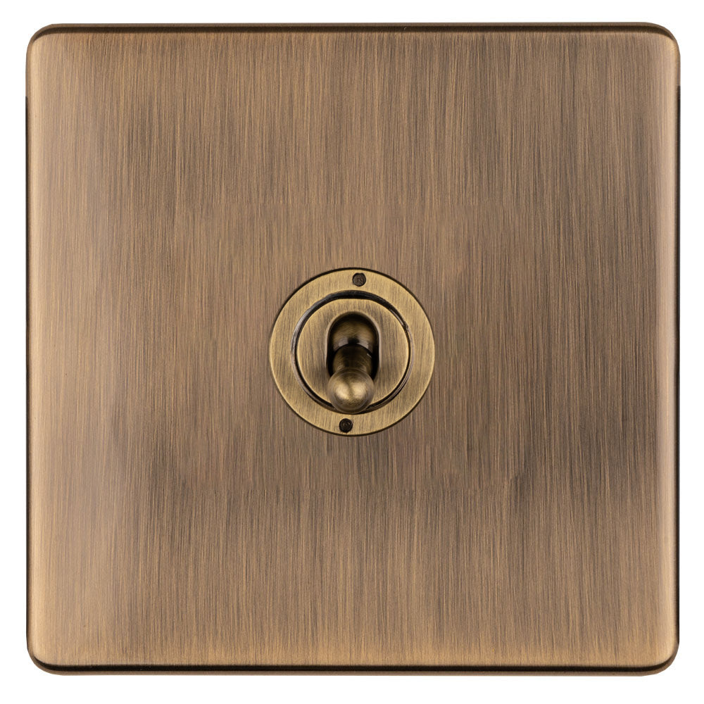This is an image showing Eurolite 1 Gang 10Amp 2Way Toggle Switch- Antique Brassabt1sw available to order from T.H. Wiggans Ironmongery in Kendal, quick delivery and discounted prices.