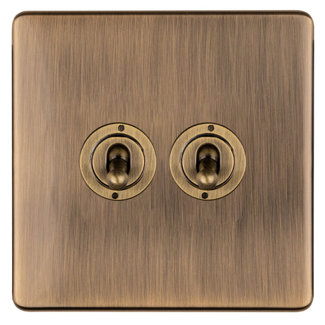 This is an image showing Eurolite 2 Gang 10Amp 2Way Toggle Switch - Antique Brassabt2sw available to order from T.H. Wiggans Ironmongery in Kendal, quick delivery and discounted prices.