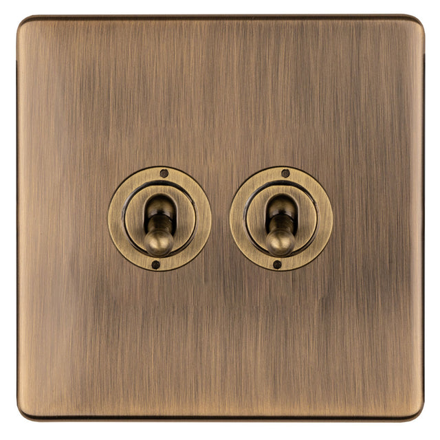 This is an image showing Eurolite 2 Gang 10Amp 2Way Toggle Switch - Antique Brassabt2sw available to order from T.H. Wiggans Ironmongery in Kendal, quick delivery and discounted prices.