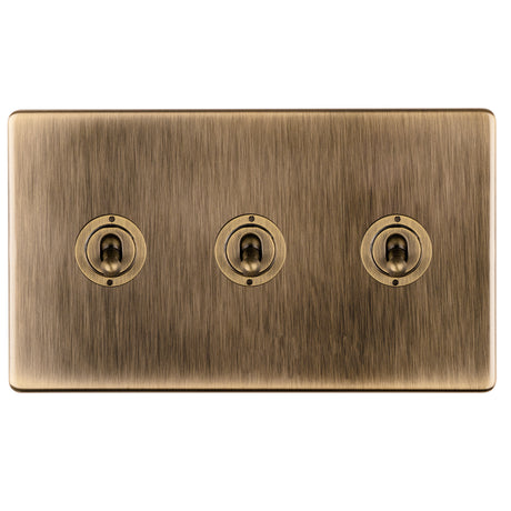 This is an image showing Eurolite 3 Gang 10Amp 2Way Toggle Switch- Antique Brassabt3sw available to order from T.H. Wiggans Ironmongery in Kendal, quick delivery and discounted prices.