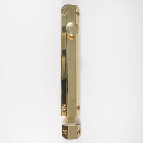 This is an image of a Carlisle Brass - Surface Bolt 203mm - Polished Brass that is availble to order from T.H Wiggans Architectural Ironmongery in Kendal in Kendal.