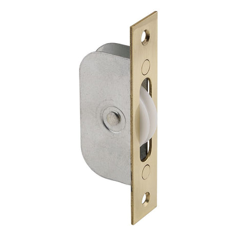 This is an image of a Carlisle Brass - Sash Window Axle Pulley No 2 - Polished Brass that is availble to order from T.H Wiggans Architectural Ironmongery in Kendal in Kendal.