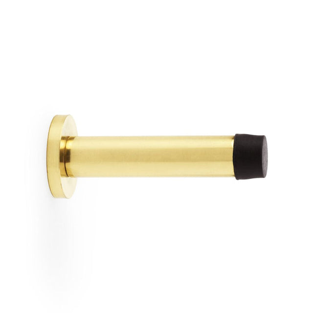 This is an image showing Alexander & Wilks Cylinder Projection Door Stop on Rose - Polished Brass Lacquered aw616pbl available to order from T.H Wiggans Ironmongery in Kendal, quick delivery and discounted prices.