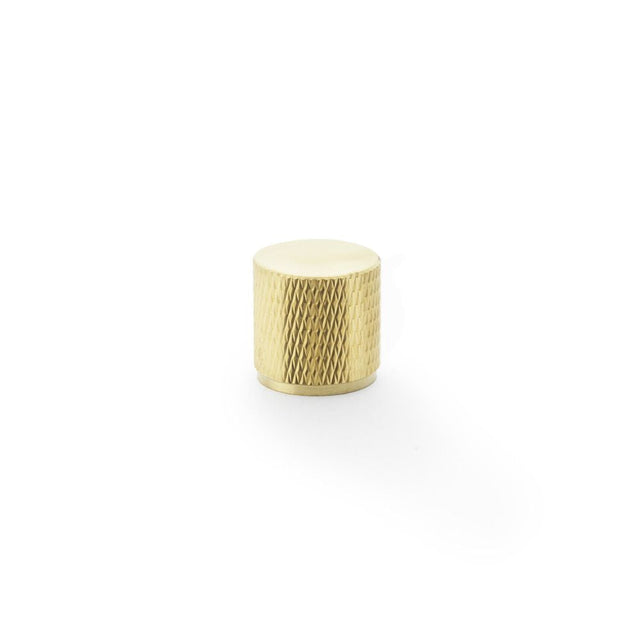 This is an image showing Alexander & Wilks Brunel Knurled Cylinder Cupboard Knob - Satin Brass PVD - 20mm aw800-20-sbpvd available to order from T.H Wiggans Ironmongery in Kendal, quick delivery and discounted prices.