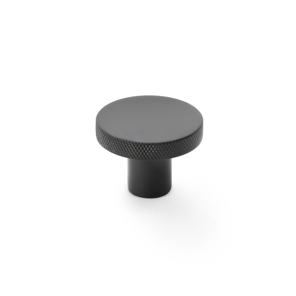 This is an image showing Alexander & Wilks Hanover Knurled Circular Cupboard Knob - Black - 38mm aw802-38-bl available to order from T.H Wiggans Ironmongery in Kendal, quick delivery and discounted prices.