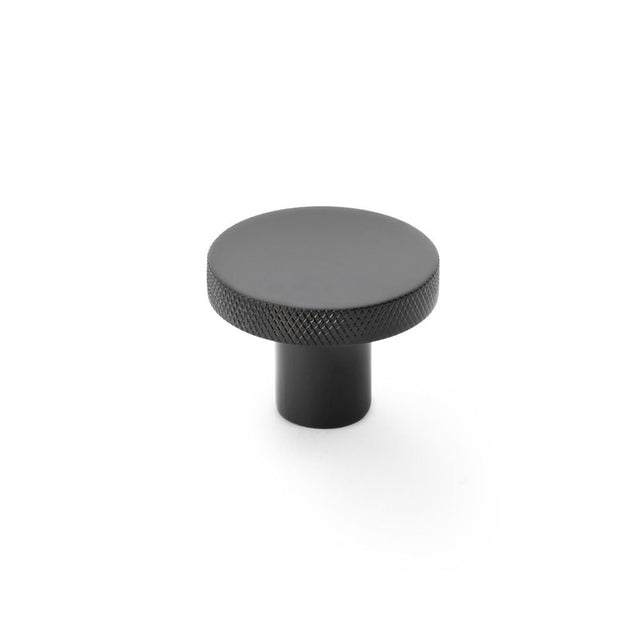 This is an image showing Alexander & Wilks Hanover Knurled Circular Cupboard Knob - Black - 38mm aw802-38-bl available to order from T.H Wiggans Ironmongery in Kendal, quick delivery and discounted prices.