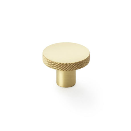 This is an image showing Alexander & Wilks Hanover Knurled Circular Cupboard Knob - Satin Brass - 38mm aw802-38-sb available to order from T.H Wiggans Ironmongery in Kendal, quick delivery and discounted prices.