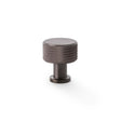 This is an image showing Alexander & Wilks Lucia Knurled Cupboard Knob - Dark Bronze PVD - 29mm aw807k-29-dbzpvd available to order from T.H Wiggans Ironmongery in Kendal, quick delivery and discounted prices.