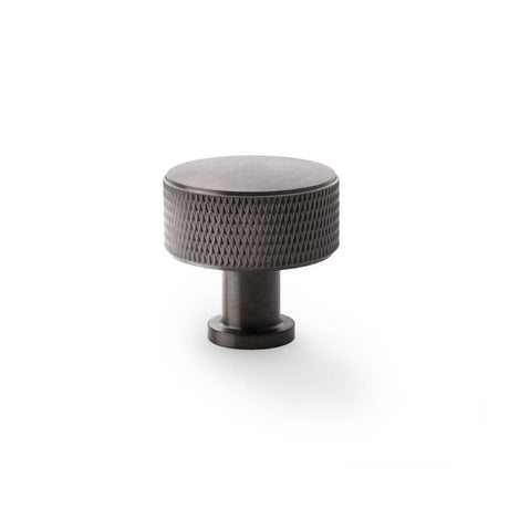 This is an image showing Alexander & Wilks Lucia Knurled Cupboard Knob - Dark Bronze PVD - 35mm aw807k-35-dbzpvd available to order from T.H Wiggans Ironmongery in Kendal, quick delivery and discounted prices.