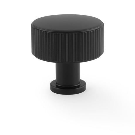 This is an image showing Alexander & Wilks Lucia Reeded Cupboard Knob - Black - 35mm aw807r-35-bl available to order from T.H Wiggans Ironmongery in Kendal, quick delivery and discounted prices.