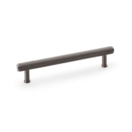 This is an image showing Alexander & Wilks Crispin Reeded T-bar Cupboard Pull Handle - Dark Bronze PVD - 160mm aw809r-160-dbzpvd available to order from T.H Wiggans Ironmongery in Kendal, quick delivery and discounted prices.