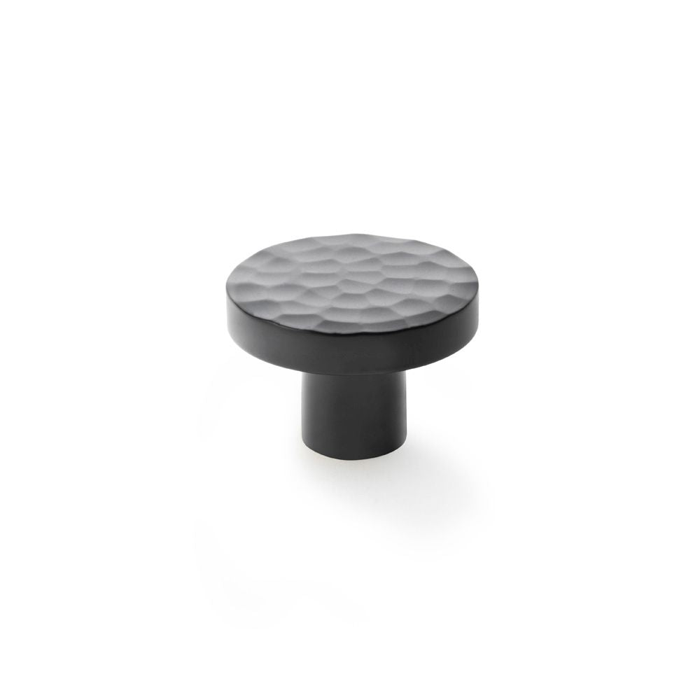 This is an image showing Alexander & Wilks Hanover Hammered Cupboard Knob - Black - 38mm aw820-38-bl available to order from T.H Wiggans Ironmongery in Kendal, quick delivery and discounted prices.