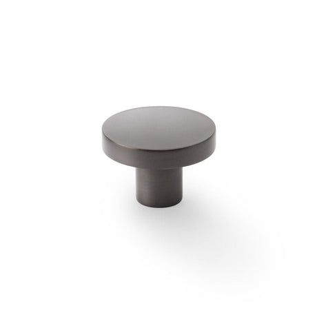 This is an image showing Alexander & Wilks Hanover Plain Cupboard Knob - Dark Bronze - Knob 38mm aw821-38-dbz available to order from T.H Wiggans Ironmongery in Kendal, quick delivery and discounted prices.