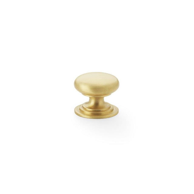 This is an image showing Alexander & Wilks Waltz Round Cupboard Knob on Stepped Rose - Satin Brass - 25mm aw825-25-sb available to order from T.H Wiggans Ironmongery in Kendal, quick delivery and discounted prices.