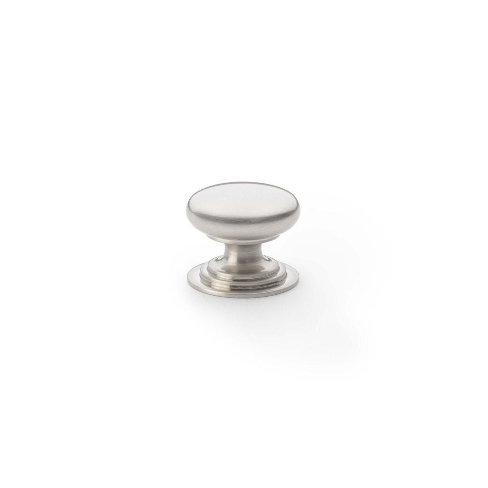 This is an image showing Alexander & Wilks Waltz Round Cupboard Knob on Stepped Rose - Satin Nickel - 25mm aw825-25-sn available to order from T.H Wiggans Ironmongery in Kendal, quick delivery and discounted prices.