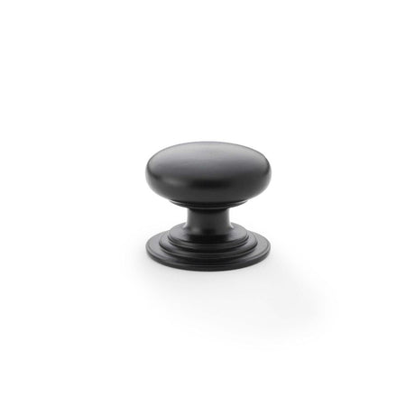 This is an image showing Alexander & Wilks Waltz Round Cupboard Knob on Stepped Rose - Black - 32mm aw825-32-bl available to order from T.H Wiggans Ironmongery in Kendal, quick delivery and discounted prices.