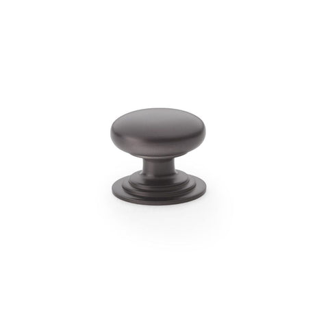 This is an image showing Alexander & Wilks Waltz Round Cupboard Knob on Stepped Rose - Dark Bronze - 32mm aw825-32-dbz available to order from T.H Wiggans Ironmongery in Kendal, quick delivery and discounted prices.