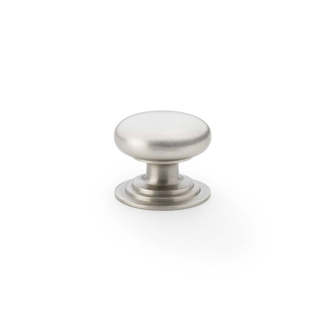 This is an image showing Alexander & Wilks Waltz Round Cupboard Knob on Stepped Rose - Satin Nickel - 32mm aw825-32-sn available to order from T.H Wiggans Ironmongery in Kendal, quick delivery and discounted prices.