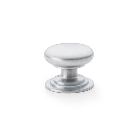 This is an image showing Alexander & Wilks Waltz Round Cupboard Knob on Stepped Rose - Satin Chrome - 38mm aw825-38-sc available to order from T.H Wiggans Ironmongery in Kendal, quick delivery and discounted prices.