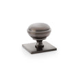 This is an image showing Alexander & Wilks Quantock Cupboard Knob on Square Backplate - Dark Bronze PVD - 34mm aw826-34-dbzpvd available to order from T.H Wiggans Ironmongery in Kendal, quick delivery and discounted prices.