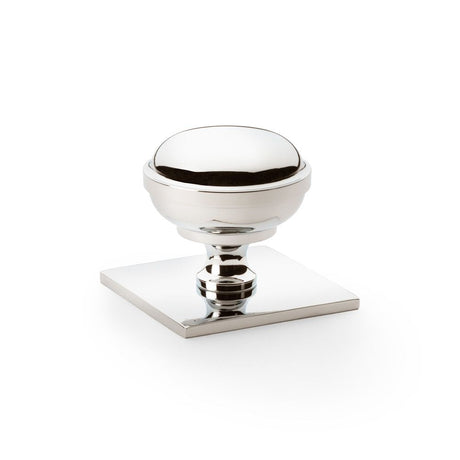 This is an image showing Alexander & Wilks Quantock Cupboard Knob on Square Backplate - Polished Nickel - 38mm aw826-38-pn available to order from T.H Wiggans Ironmongery in Kendal, quick delivery and discounted prices.