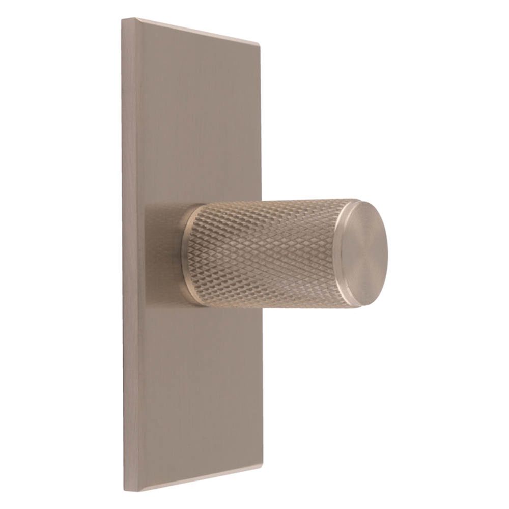 This is an image of a Carlisle Brass - Knurled Cylinder Knob on backplate that is availble to order from T.H Wiggans Architectural Ironmongery in Kendal in Kendal.