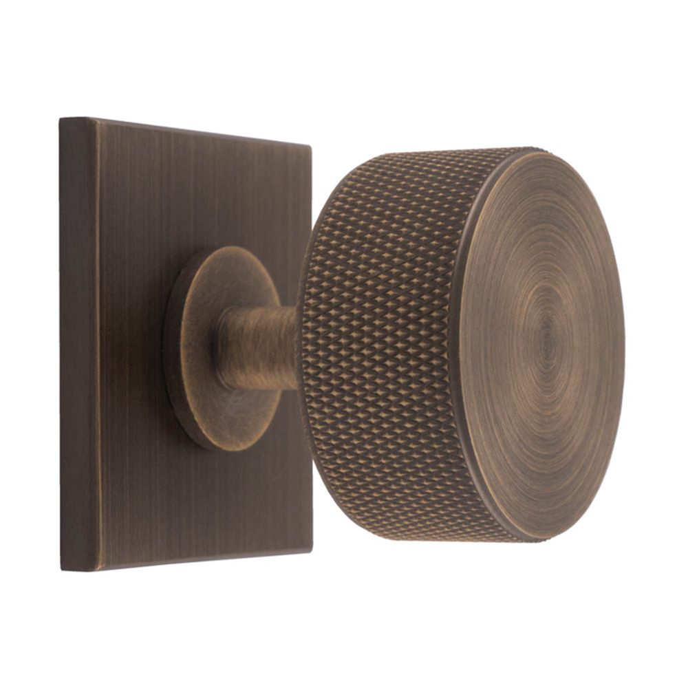 This is an image of a Carlisle Brass - Knurled Radio Knob on Backplate that is availble to order from T.H Wiggans Architectural Ironmongery in Kendal in Kendal.