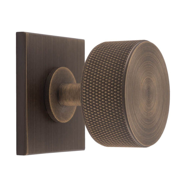 This is an image of a Carlisle Brass - Knurled Radio Knob on Backplate that is availble to order from T.H Wiggans Architectural Ironmongery in Kendal in Kendal.