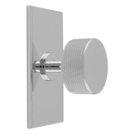 This is an image of a Carlisle Brass - Knurled Radio Knob on Backplate that is availble to order from T.H Wiggans Architectural Ironmongery in Kendal in Kendal.