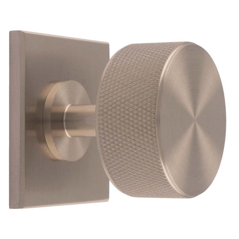 This is an image of a Carlisle Brass - Knurled Radio Knob on Backplate that is availble to order from T.H Wiggans Architectural Ironmongery in Kendal in Kendal.