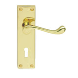 This is an image of Carlisle Brass - Contract Victorian Scroll Lever on Lock Backplate - Polished Br available to order from T.H Wiggans Architectural Ironmongery in Kendal, quick delivery and discounted prices.