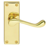 This is an image of Carlisle Brass - Contract Victorian Scroll Lever on Latch Backplate - Polished B available to order from T.H Wiggans Architectural Ironmongery in Kendal, quick delivery and discounted prices.