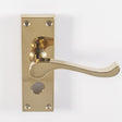 This is an image of Carlisle Brass - Contract Victorian Scroll Lever on Privacy Backplate - Polished available to order from T.H Wiggans Architectural Ironmongery in Kendal, quick delivery and discounted prices.